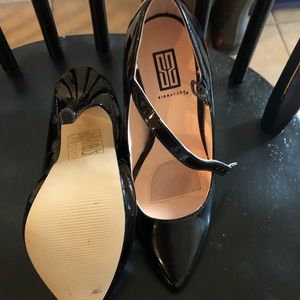 Signature Sz 5.5 patent leather stiletto heel.